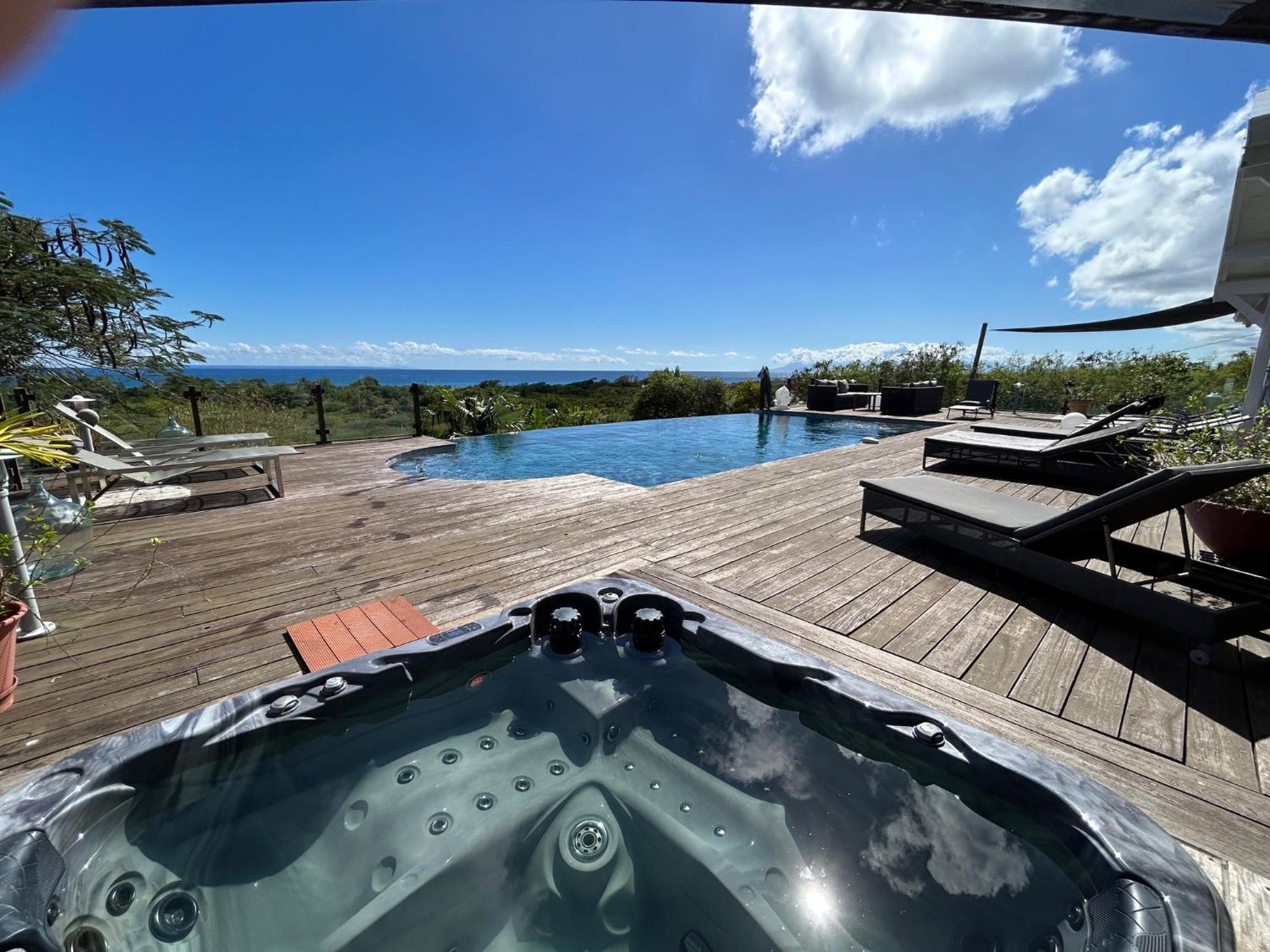 Villa Deluxe L'Hacienda Villa Vue Mer 180 Piscine Jacuzzi Proche Plage Marina Golf Pointe Des Chateaux Et Casino Jardin Clos Voyage Durable サン・フランソワ エクステリア 写真